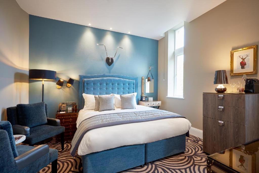 ออดเฟลโลว์ ออน เดอะ พาร์ค Hotel ชีเดิล ห้อง รูปภาพ A bedroom at The Ivy Collection